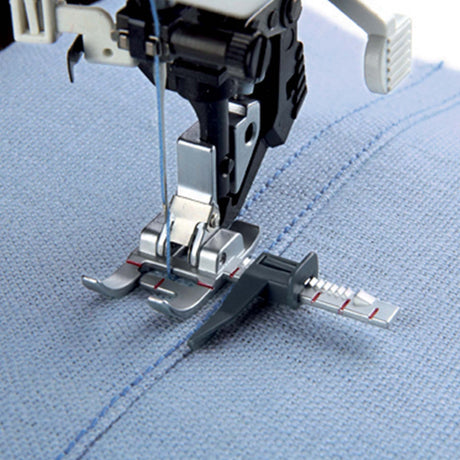 Close up of the Pfaff Adjustable Guide foot in action